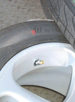 Example of tire-to-wheel mounting where the red dot is aligned to the wheel&rsquo;s valve stem. In this specific example, the valve stem area happens to be the wheel&rsquo;s low runout point.