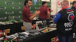 Tool distributors visiting VIM Tools booth at the Matco Tools Expo